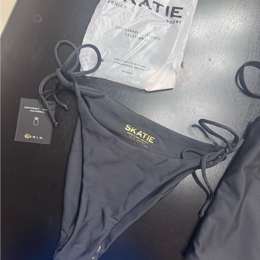 Skatie Black Tie-Side Bikini Bottoms with Gold Logo